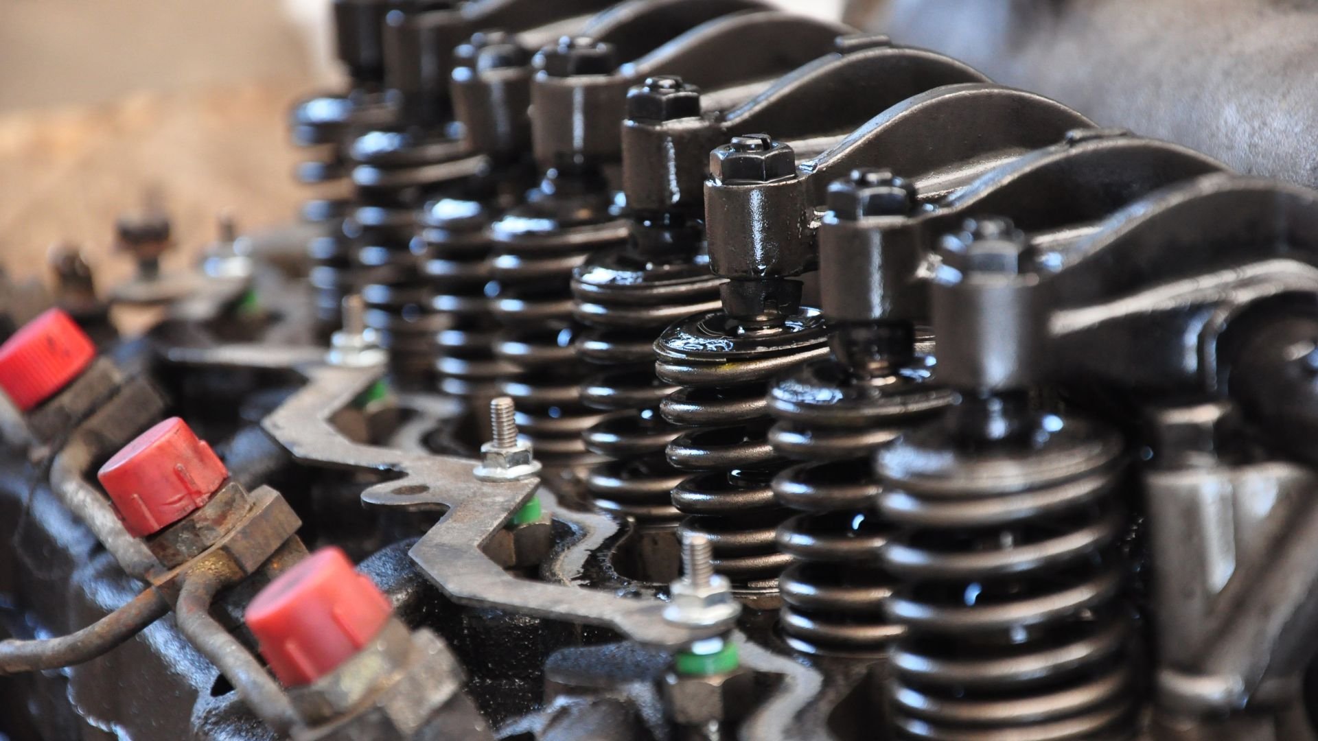 Close-up of engine valves and springs in a mechanical system